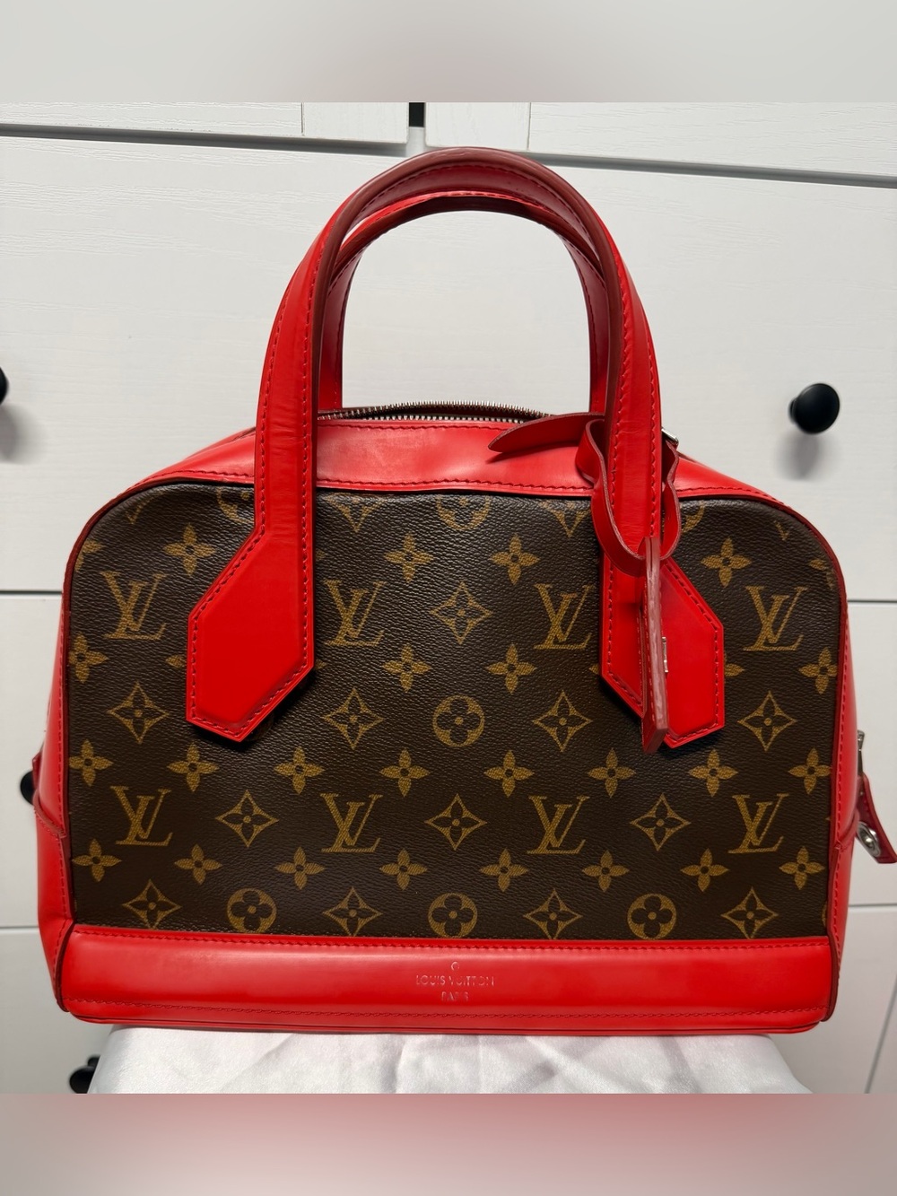 Louis Vuitton Dora PM brown monogram canvas with red leather trim